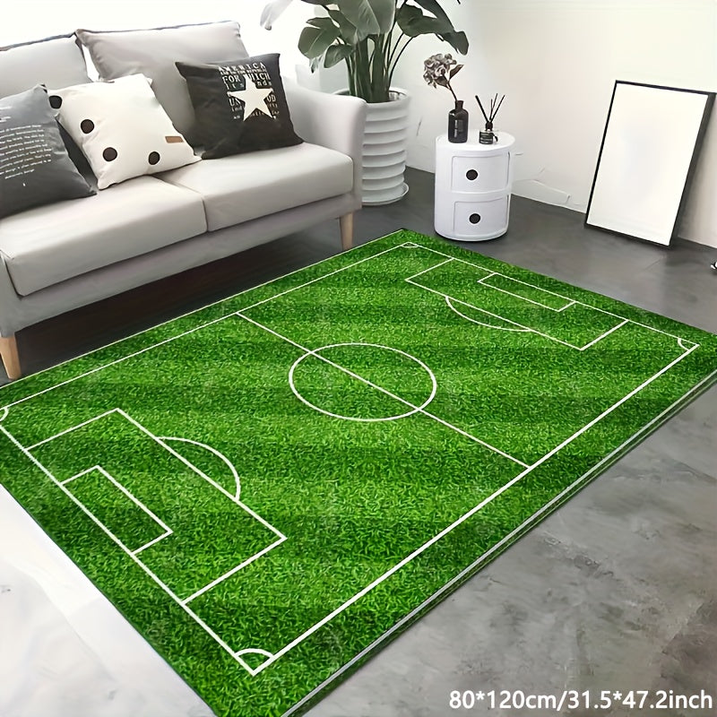 1 piece of a non-slip soft carpet floor mat designed as a soccer field football stadium, featuring green grass with painted lines for sports play. Can be used indoors or outdoors as a runner rug or yoga mat to add a sporty touch to home decor.