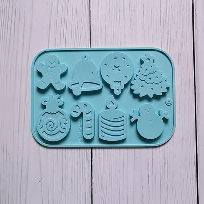 1 piece of Christmas Silicone Cookie Mold with 8 cavities, featuring shapes of Christmas tree, elk, bell, and snowman. This versatile mold can be used to make cakes, chocolates, biscuits, candies, jellies, and puddings. Perfect for creating festive