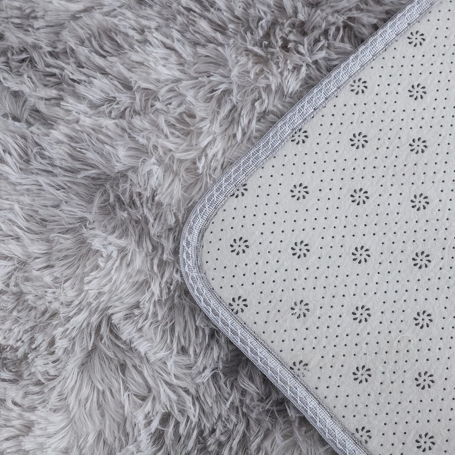 1 piece of a round, fresh, and simple tie-dye light grey plush rug. Made from super soft premium fabric that is furry and skin-friendly, this decorative rug has upgraded fabric with fluffy sponge, thickened, and no shed. It is firm, durable, lightweight