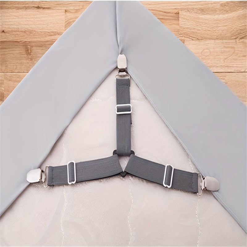 1 piece of bed sheet fixer strap with 4 pieces of fasteners. This adjustable triangle clip is designed to prevent bed sheets from slipping and ensures a secure fit.