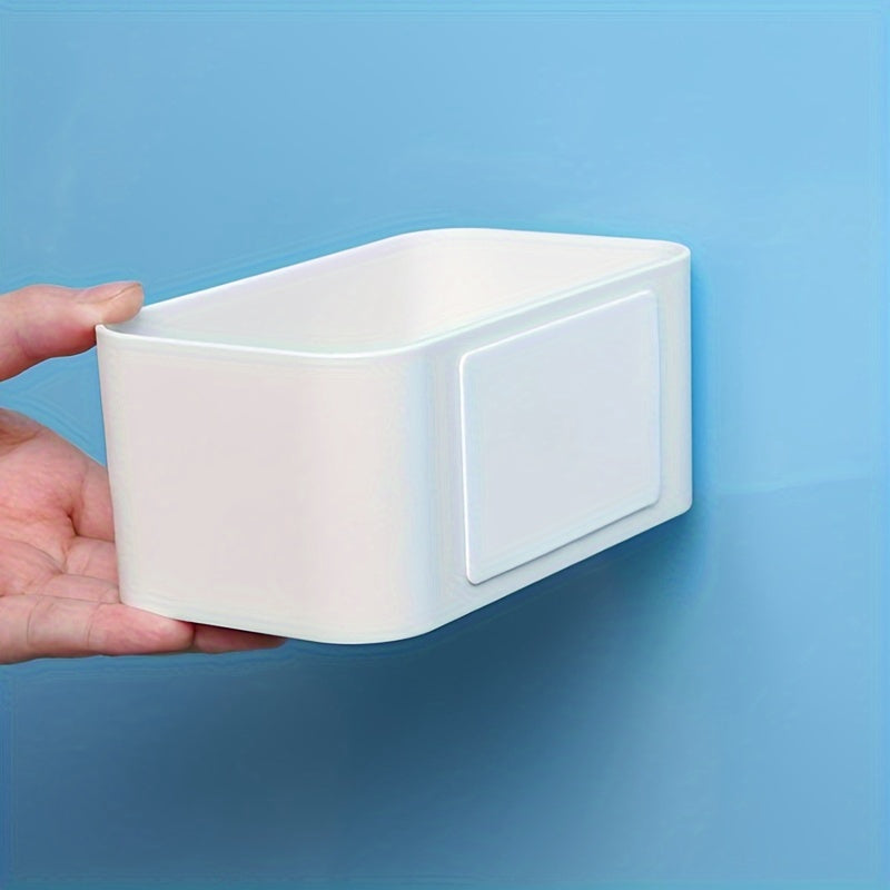 1 piece of a simple storage box that can be wall-mounted. It is punch-free and adhesive, leaving no trace behind. This organizer is perfect for storing bathroom toiletries, as well as holding remote controls and other sundries in the living room.