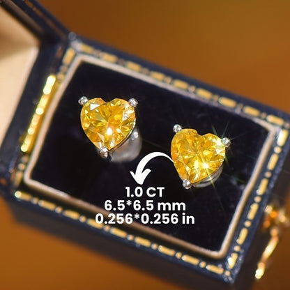 Yellow Heart-Shaped Moissanite Stud Earrings in 925 Sterling Silver with 18K Golden Plating - Set of 2. These vintage-inspired earrings are perfect for the autumn season, Mardi Gras celebrations, and music festivals. They are versatile for both daily