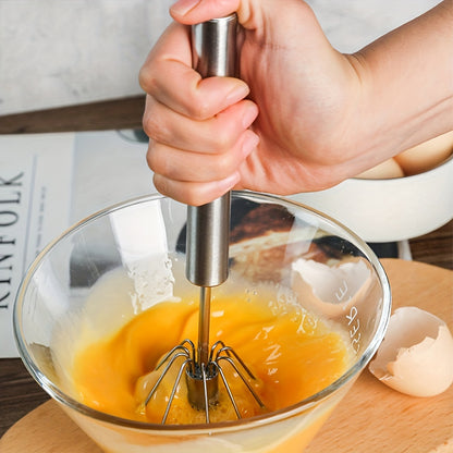 1 piece of a stainless steel hand mixer with 4-speed settings for manual, battery-free operation, making blending in baking and cooking effortless. Includes a durable whisk attachment for mixing eggs and more.