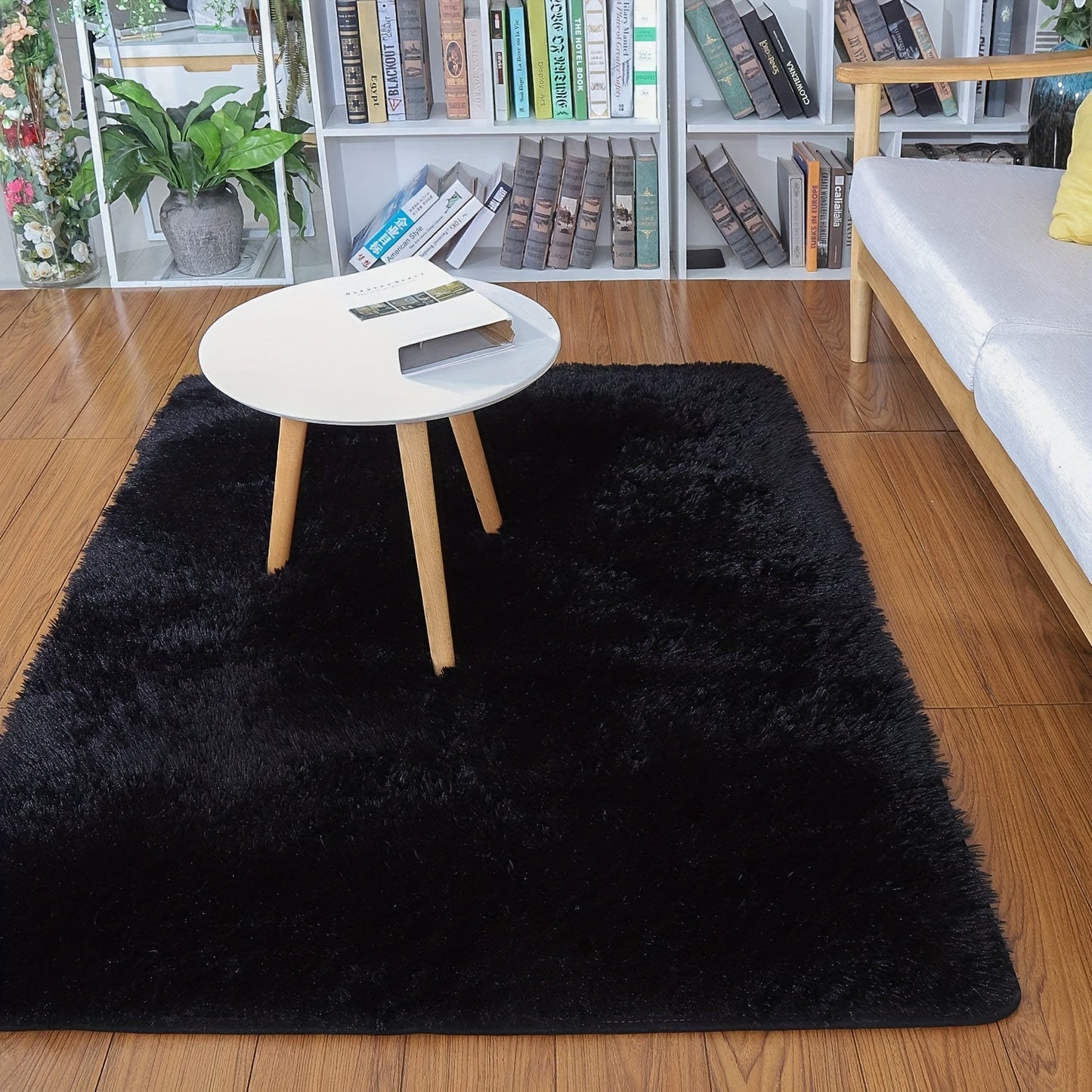 1 piece of Fluffy Black Shag Area Rug, made with extra soft and shaggy materials. Perfect for adding a cozy touch to your bedroom, living room, or outdoor space. Great for home decor.