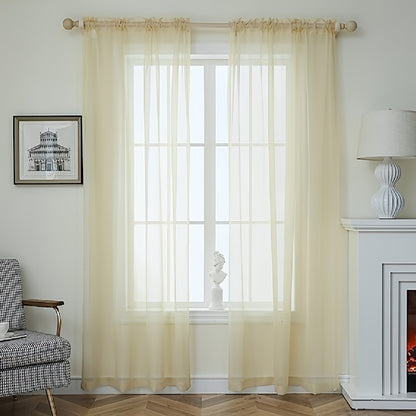 Two panels of sheer curtains with a basic rod pocket design, perfect for adding a touch of elegance to your bedroom, office, living room, yard, kitchen, or any other space in your home.