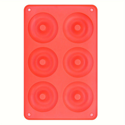 1 piece of a 6-Cavity Silicone Donut Mold for Baking, designed to withstand high temperatures. Ideal for creating large donut cakes, puddings, jellies, and chocolates. Can also be used as a DIY handmade soap, wax, or resin mold. A versatile kitchen tool