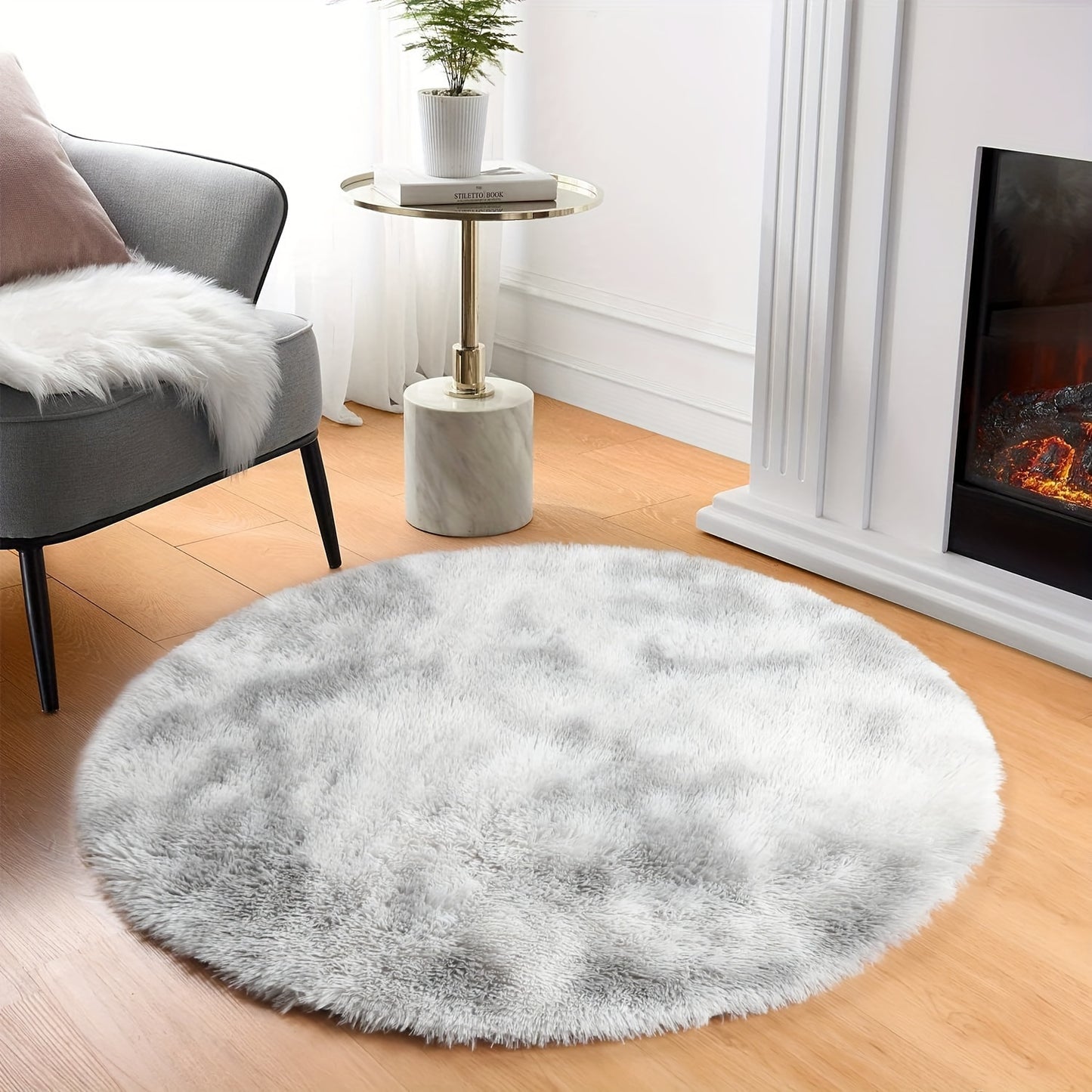 1 piece of a round, fresh, and simple tie-dye light grey plush rug. Made from super soft premium fabric that is furry and skin-friendly, this decorative rug has upgraded fabric with fluffy sponge, thickened, and no shed. It is firm, durable, lightweight