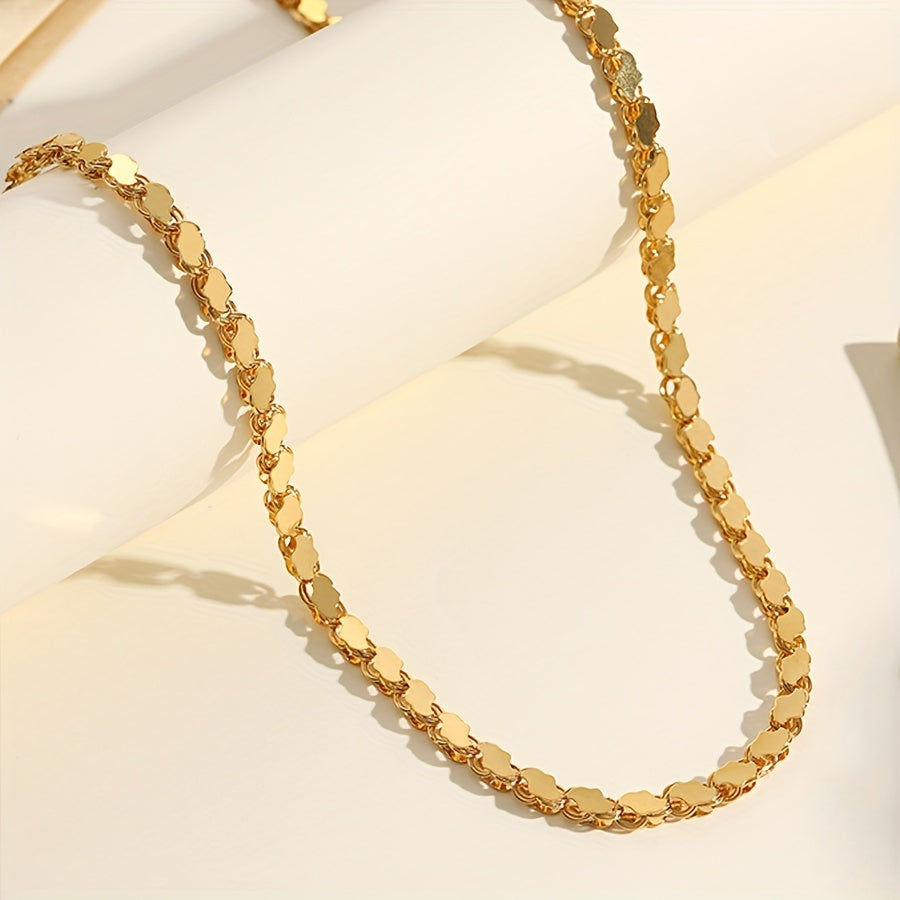 Handcrafted with care, this elegant chain necklace for women is made from gold-plated copper. Its sophisticated design makes it perfect for both casual attire and special occasions.