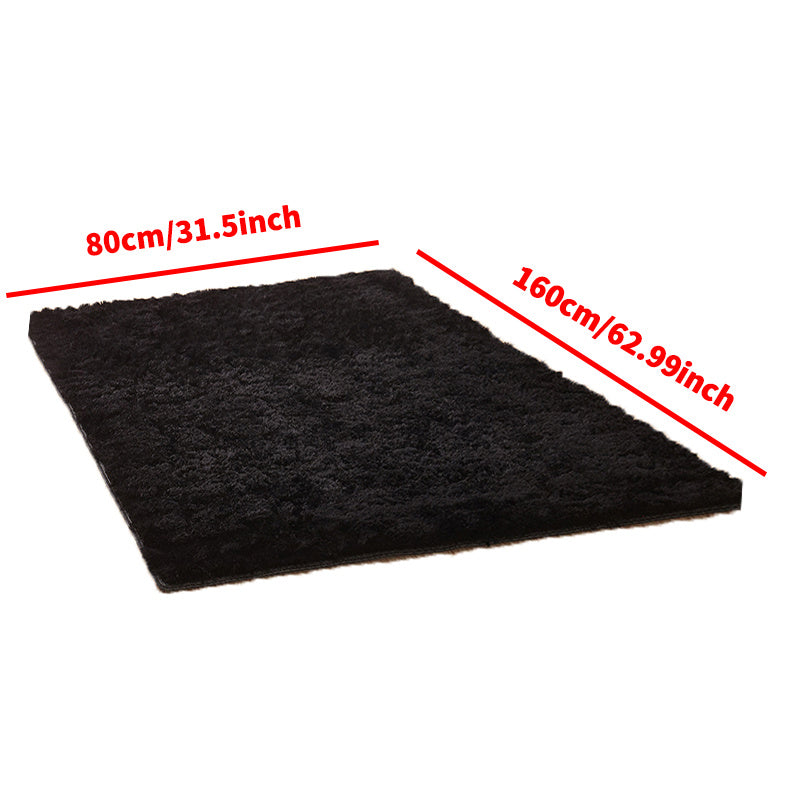 1 piece of Fluffy Black Shag Area Rug, made with extra soft and shaggy materials. Perfect for adding a cozy touch to your bedroom, living room, or outdoor space. Great for home decor.