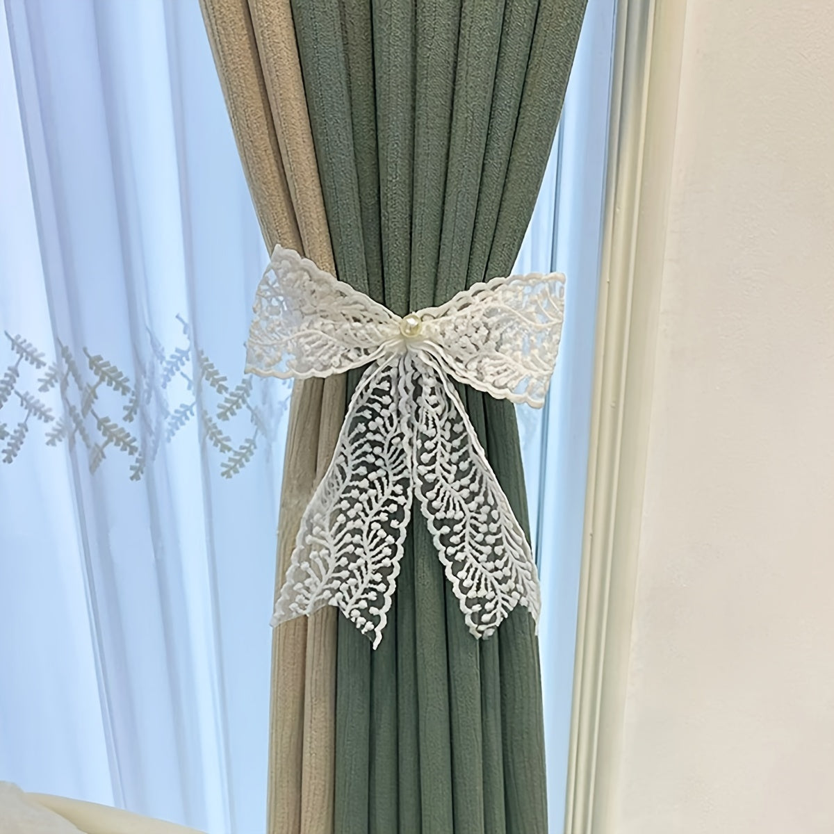 1 Pair of Bow Lace Pearl Curtain Tiebacks - A chic and versatile way to add a touch of elegance to your curtains. These French lace pearl ribbon tiebacks are perfect for use in the bedroom, living room, study, coffee shop, or any other room in your home