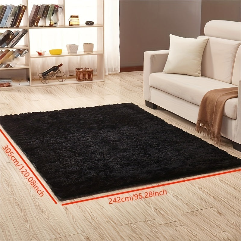 1 piece of Fluffy Black Shag Area Rug, made with extra soft and shaggy materials. Perfect for adding a cozy touch to your bedroom, living room, or outdoor space. Great for home decor.