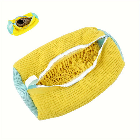 Yellow and teal zippered shoe wash bag for convenient laundry care of sneakers. Made of anti-deformation polyester with a mesh bottom and oval shape. Perfect for keeping your shoes clean and protected during the laundry process.