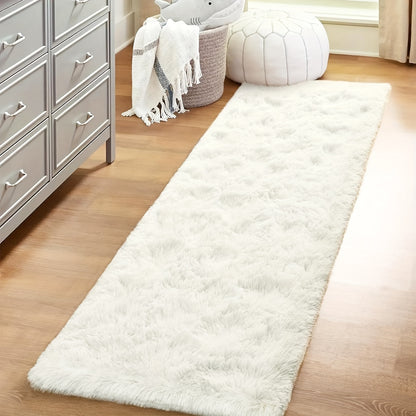 1 piece of a fluffy plush rug suitable for bedroom and living room decor. This comfortable bedside rug adds a touch of coziness to any room. Its furry and decorative design makes it a perfect addition to your indoor decor.