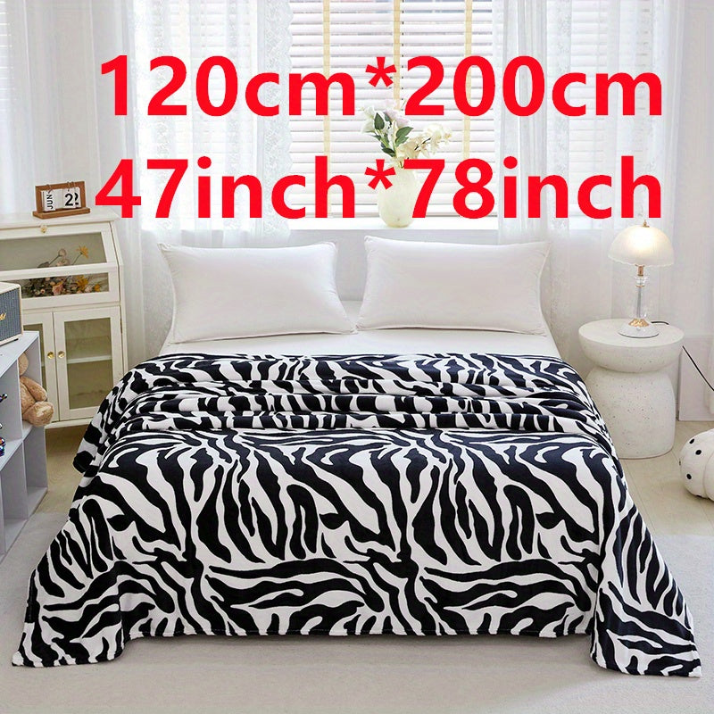 Zebra Patterned Blanket, Luxuriously Soft Throw Blanket Ideal for Snuggling Up on the Couch, Sofa, Office, Bed, Camping or Travel. The perfect multi-purpose gift blanket that can be used in all seasons.