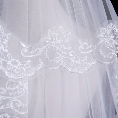 [Top Pick] This elegant bridal veil features lace trim and floral patterns for a chic look. Made of polyester, it is perfect for photoshoots and sophisticated events. Comes with a hair comb and is a great choice for high-end balls.