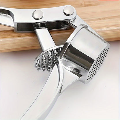 1 piece of a multifunctional stainless steel garlic press, also known as a metal garlic mincer, washable garlic crusher, kitchen garlic chopper, ginger squeezer, garlic masher, and garlic mincer. This versatile kitchen tool is a must-have for any