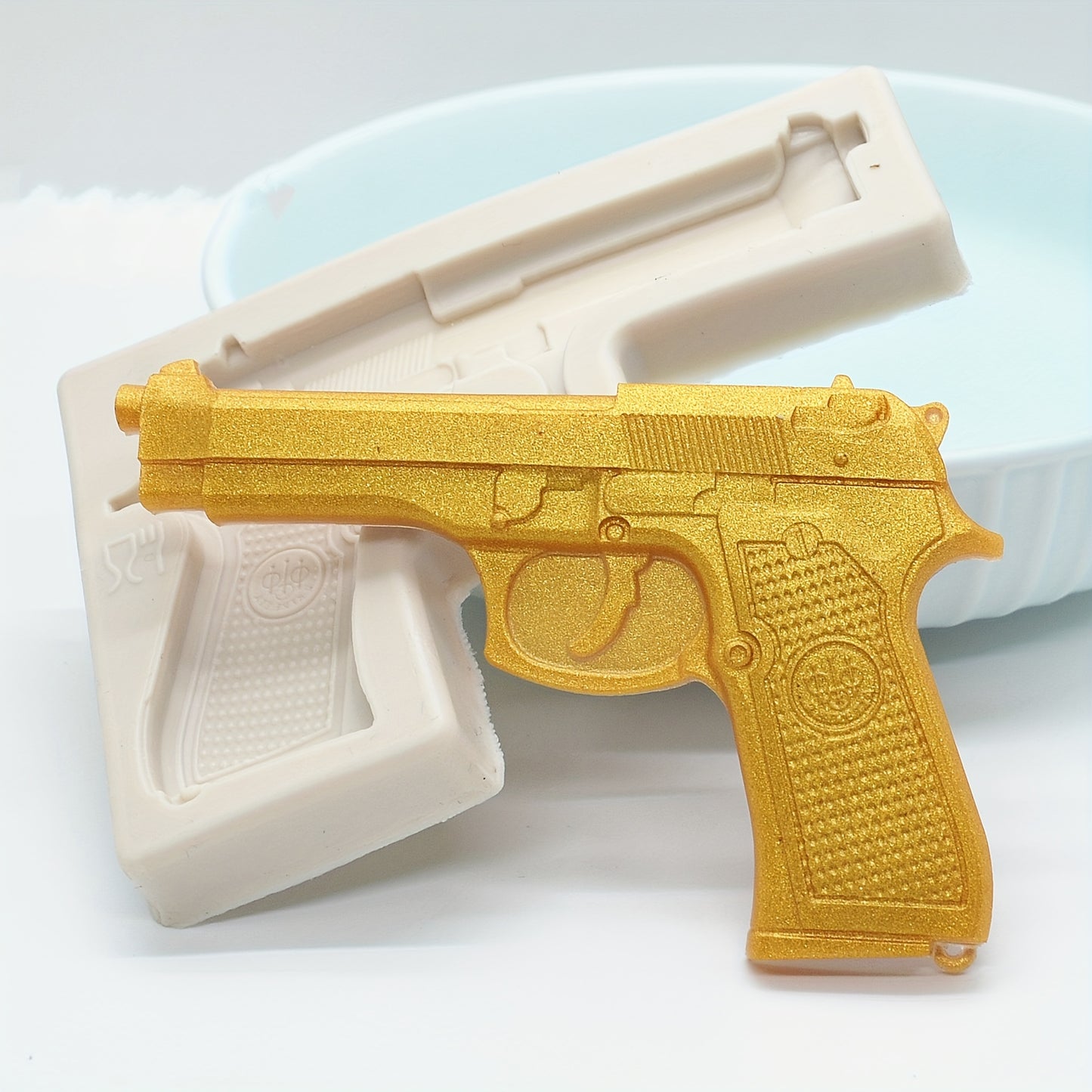 1 piece Gun Bullet Chocolate Mold, 3D Silicone Mold in the shape of a Pistol AK Rifle, ideal for making candy, fondant, and other treats. A must-have for baking enthusiasts, this tool is perfect for creating unique and fun kitchen creations.