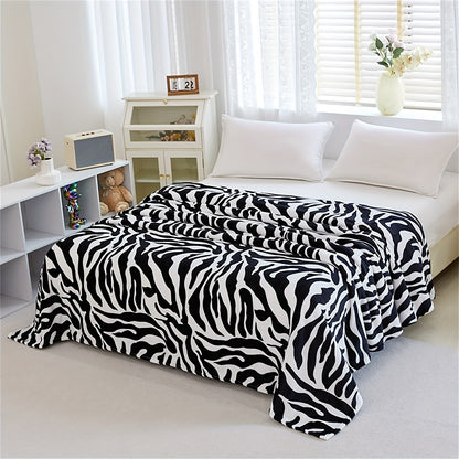 Zebra Patterned Blanket, Luxuriously Soft Throw Blanket Ideal for Snuggling Up on the Couch, Sofa, Office, Bed, Camping or Travel. The perfect multi-purpose gift blanket that can be used in all seasons.