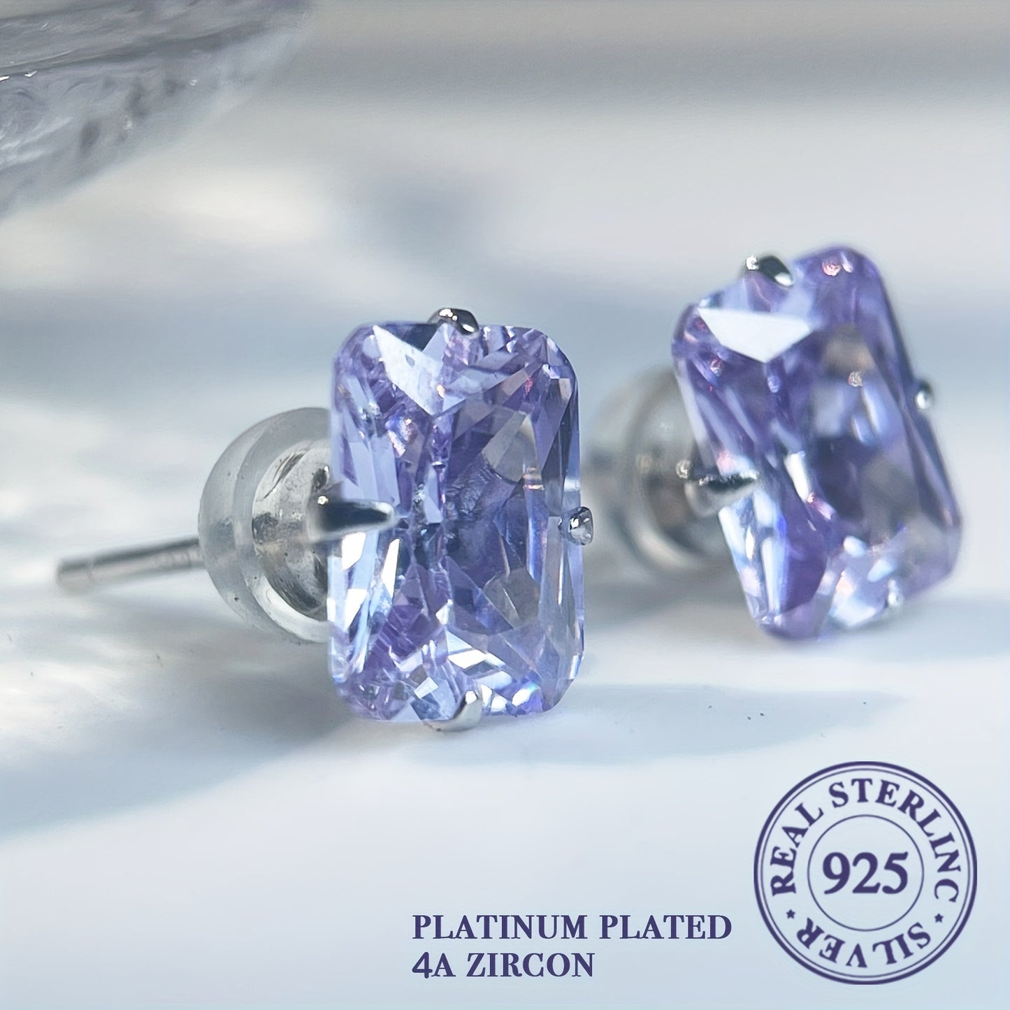 'These refined rectangular stud earrings in 925 sterling silver feature a lovely light purple and blue hue. Versatile for everyday wear and special occasions, they make an ideal Valentine's gift.'