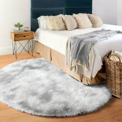 1 piece of a round, fresh, and simple tie-dye light grey plush rug. Made from super soft premium fabric that is furry and skin-friendly, this decorative rug has upgraded fabric with fluffy sponge, thickened, and no shed. It is firm, durable, lightweight