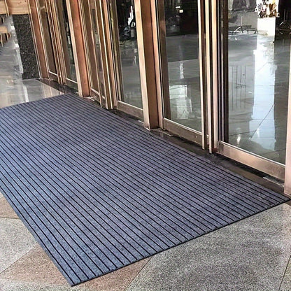 1 piece of a striped door mat that is water-absorbing and can be used as a bath pad. It is also anti-skid, oil-proof, and waterproof. This living room rug is washable and suitable for use in the living room, bedroom, bathroom, or as home decor. It can be