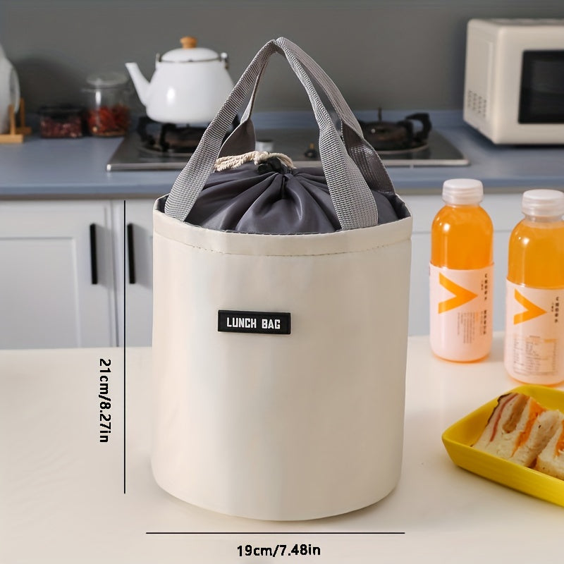 - Large round lunch bag with cylinder insulation, made of aluminum foil for portability and to keep meals warm at work.