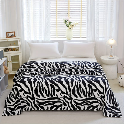 Zebra Patterned Blanket, Luxuriously Soft Throw Blanket Ideal for Snuggling Up on the Couch, Sofa, Office, Bed, Camping or Travel. The perfect multi-purpose gift blanket that can be used in all seasons.