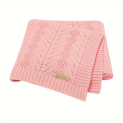 Youngsters Blanket made from soft knit material with a hollow-out design. This versatile air conditioning throw is perfect for use on the sofa, at home, or for parties. It can be hand washed and comes in bright pink, light blue, and cream colors.