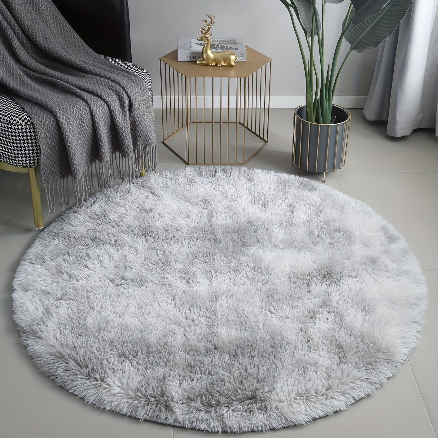 1 piece of a round, fresh, and simple tie-dye light grey plush rug. Made from super soft premium fabric that is furry and skin-friendly, this decorative rug has upgraded fabric with fluffy sponge, thickened, and no shed. It is firm, durable, lightweight