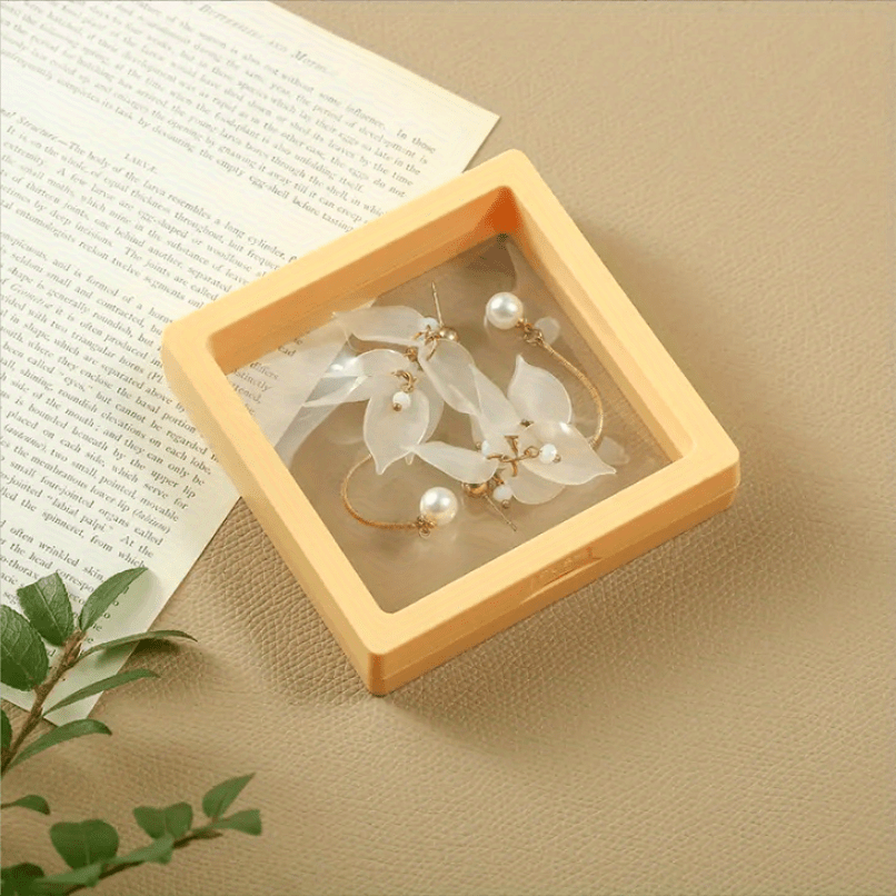 [Best Seller] One piece of transparent PE film jewelry box designed for showcasing necklaces, earrings, rings, and other jewelry on counters. The box measures 9cm * 9cm and is sealed to prevent moisture, ensuring that your jewelry remains free from