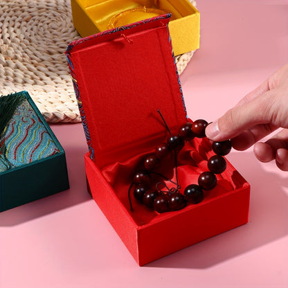 1 piece of Chinese Style Storage Box with Tassel, featuring Ancient Poetry Fabric Brocade design. Perfect for holding beads, bracelets, and other jewelry. Simple, elegant, and delicate, making it a great retro gift idea.