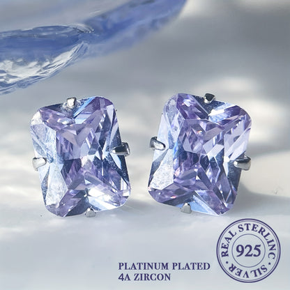 'These refined rectangular stud earrings in 925 sterling silver feature a lovely light purple and blue hue. Versatile for everyday wear and special occasions, they make an ideal Valentine's gift.'