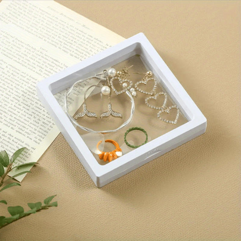 [Best Seller] One piece of transparent PE film jewelry box designed for showcasing necklaces, earrings, rings, and other jewelry on counters. The box measures 9cm * 9cm and is sealed to prevent moisture, ensuring that your jewelry remains free from