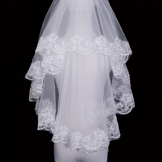 [Top Pick] This elegant bridal veil features lace trim and floral patterns for a chic look. Made of polyester, it is perfect for photoshoots and sophisticated events. Comes with a hair comb and is a great choice for high-end balls.