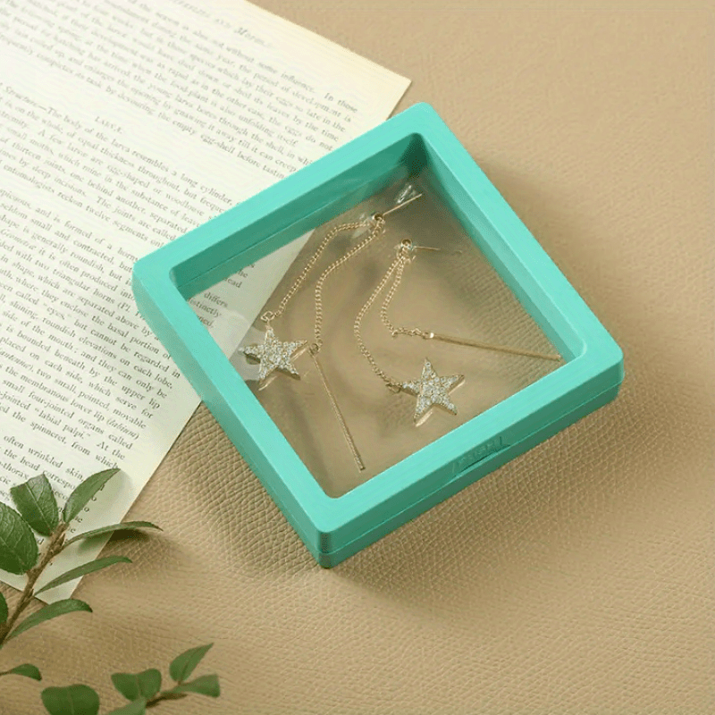 [Best Seller] One piece of transparent PE film jewelry box designed for showcasing necklaces, earrings, rings, and other jewelry on counters. The box measures 9cm * 9cm and is sealed to prevent moisture, ensuring that your jewelry remains free from