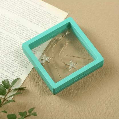 [Best Seller] One piece of transparent PE film jewelry box designed for showcasing necklaces, earrings, rings, and other jewelry on counters. The box measures 9cm * 9cm and is sealed to prevent moisture, ensuring that your jewelry remains free from