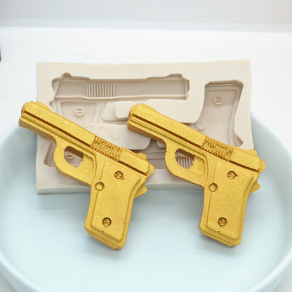 1 piece Gun Bullet Chocolate Mold, 3D Silicone Mold in the shape of a Pistol AK Rifle, ideal for making candy, fondant, and other treats. A must-have for baking enthusiasts, this tool is perfect for creating unique and fun kitchen creations.