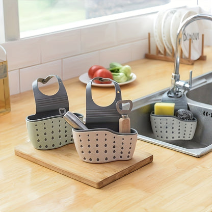 1 hanging basket with sink sponge rack and organizer, silicone storage box, adjustable shoulder strap for drainage, perfect for kitchen sink absorption, bathroom faucet hanging basket storage, and organizing kitchen supplies.