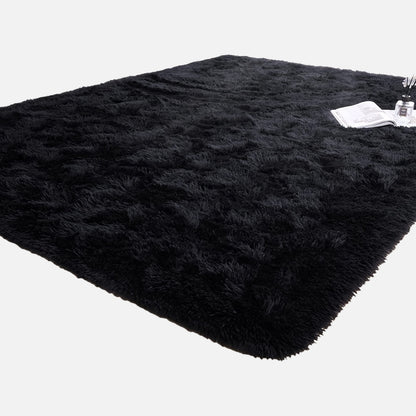 1 piece of Fluffy Black Shag Area Rug, made with extra soft and shaggy materials. Perfect for adding a cozy touch to your bedroom, living room, or outdoor space. Great for home decor.