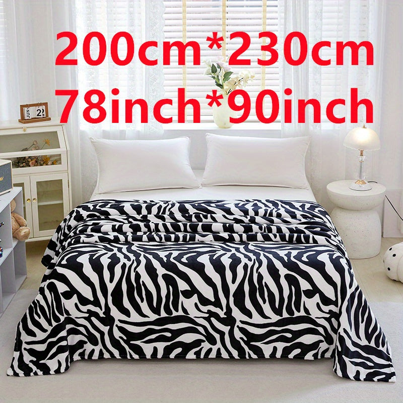 Zebra Patterned Blanket, Luxuriously Soft Throw Blanket Ideal for Snuggling Up on the Couch, Sofa, Office, Bed, Camping or Travel. The perfect multi-purpose gift blanket that can be used in all seasons.